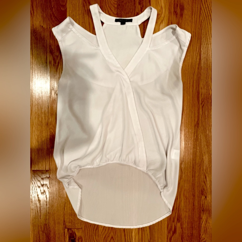 Flattering Noelle white collar bone cut out blouse!
